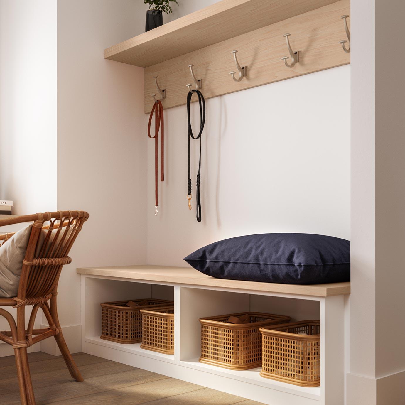 Custom built laundry room with utilty benches and folding table by California Closets