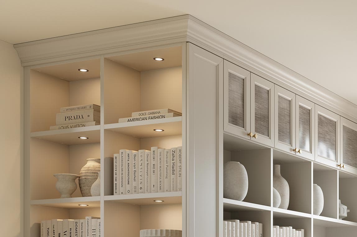 Elegant reading nook in the home with custom bookshelves from California Closets