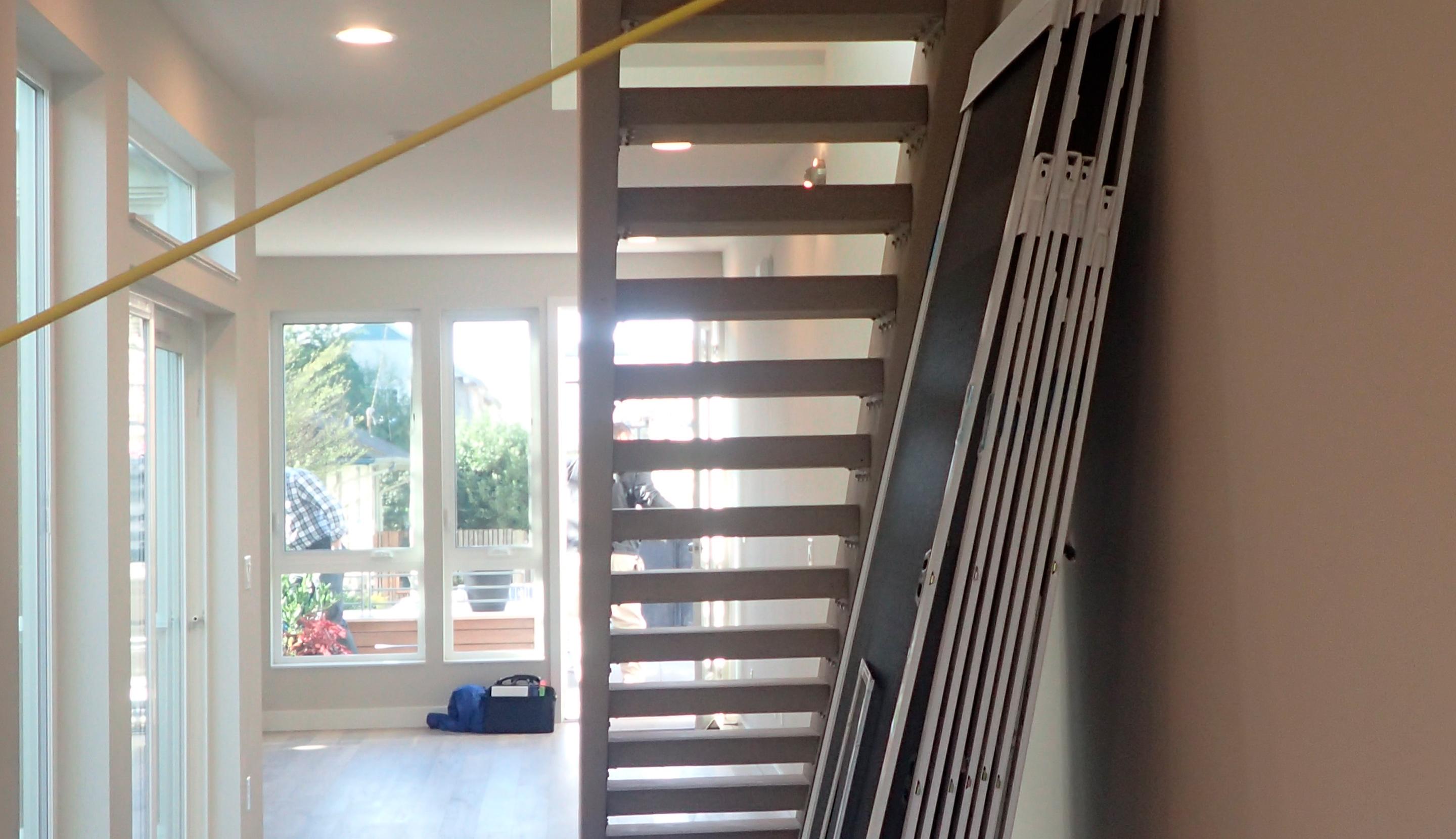 Under the stairs space ready for pantry design by California Closets
