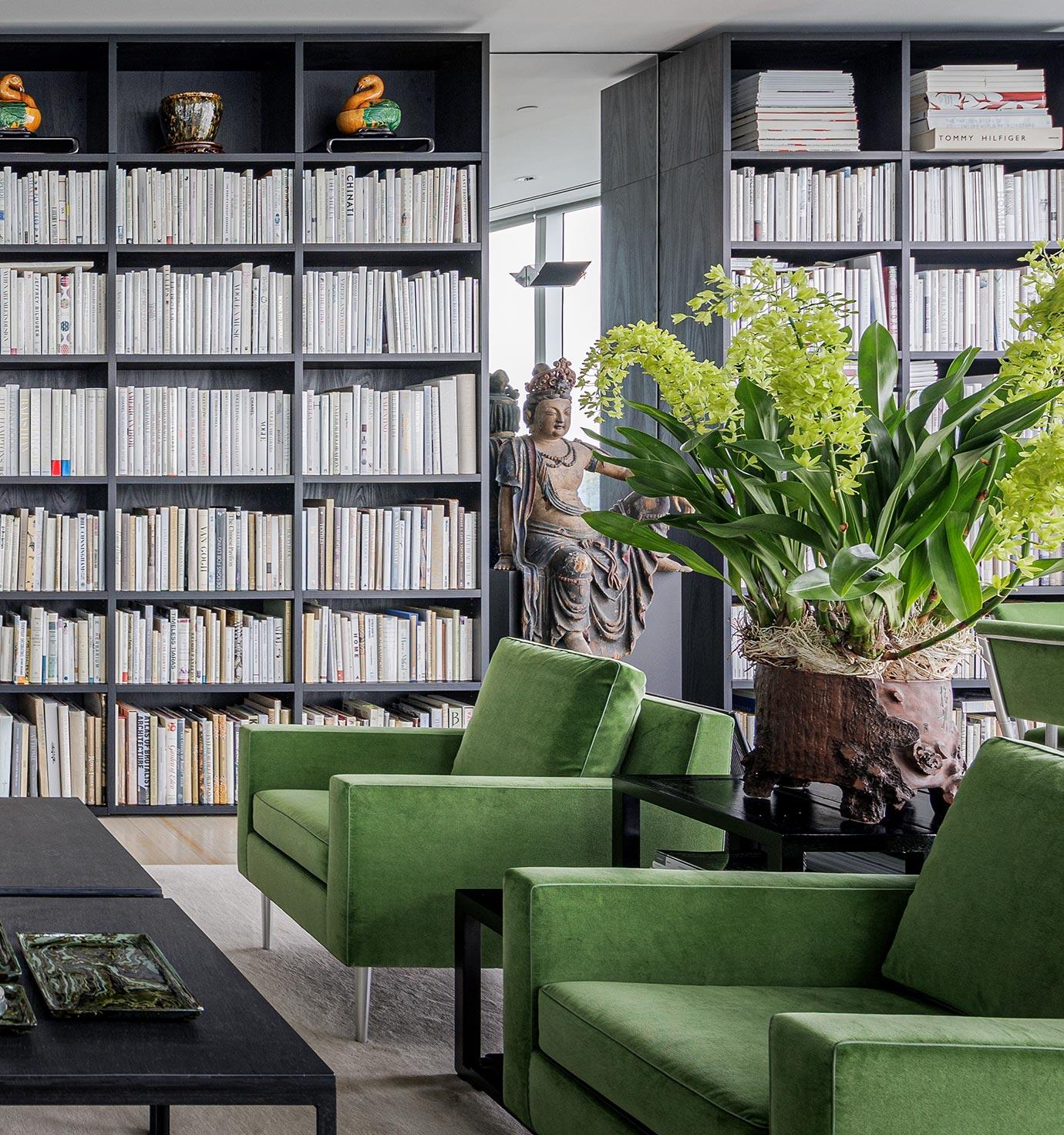 Customized dark finish shelving for living room from California Closets