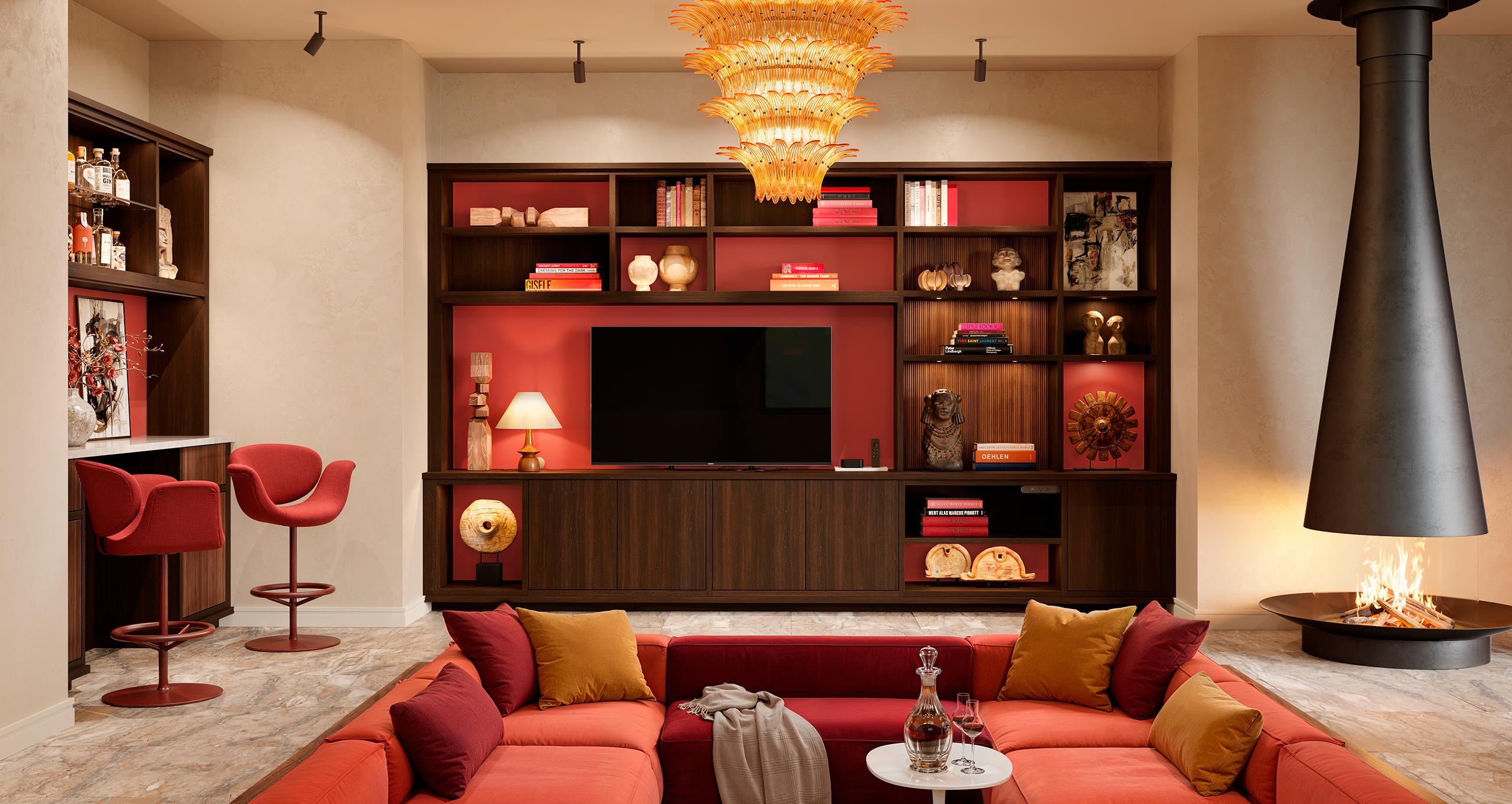 Modern media wall with glass-front cabinets and styled shelving in dark wood by California Closets.
