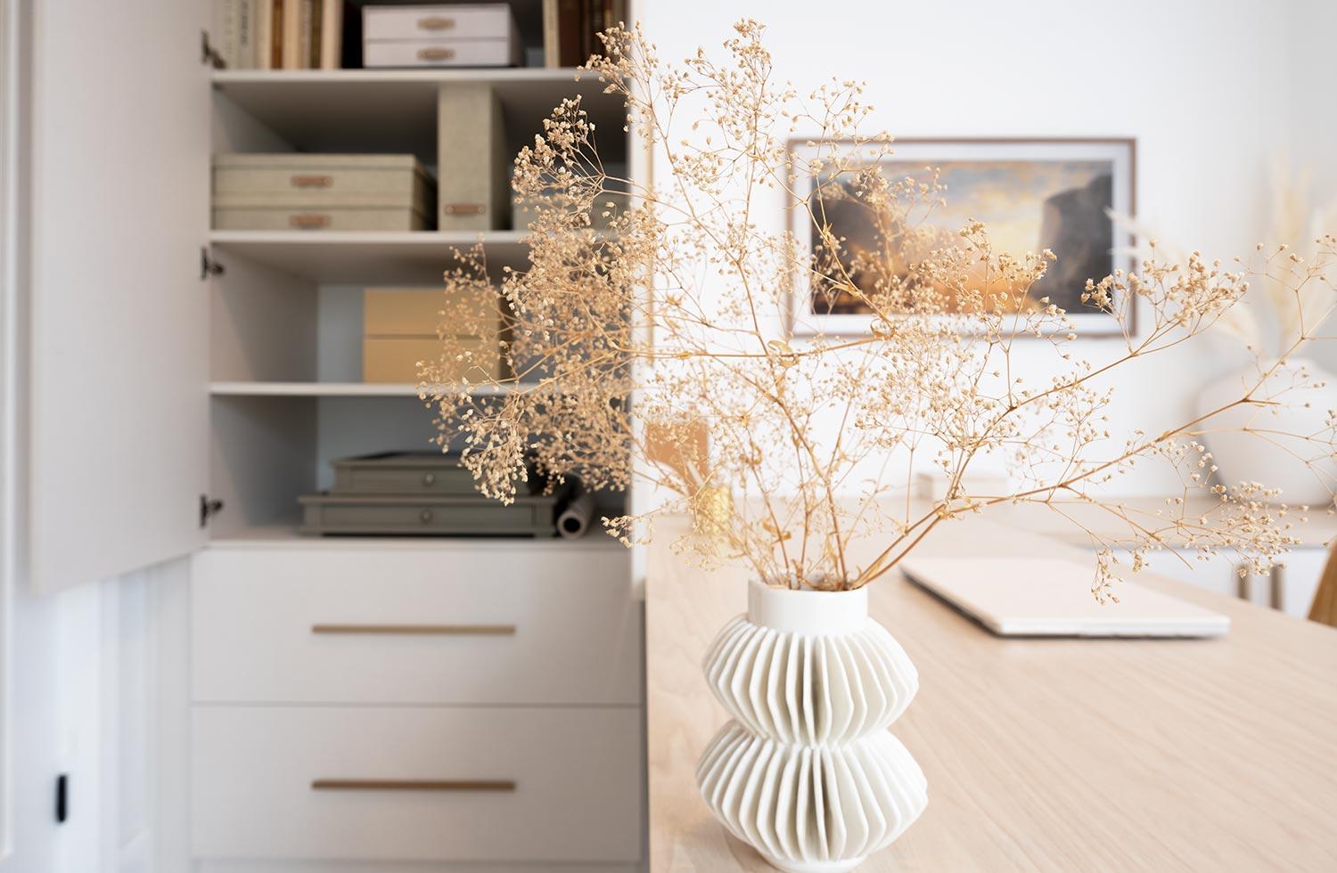 Custom workspace with custom drawers and custom shelving design by California Closets