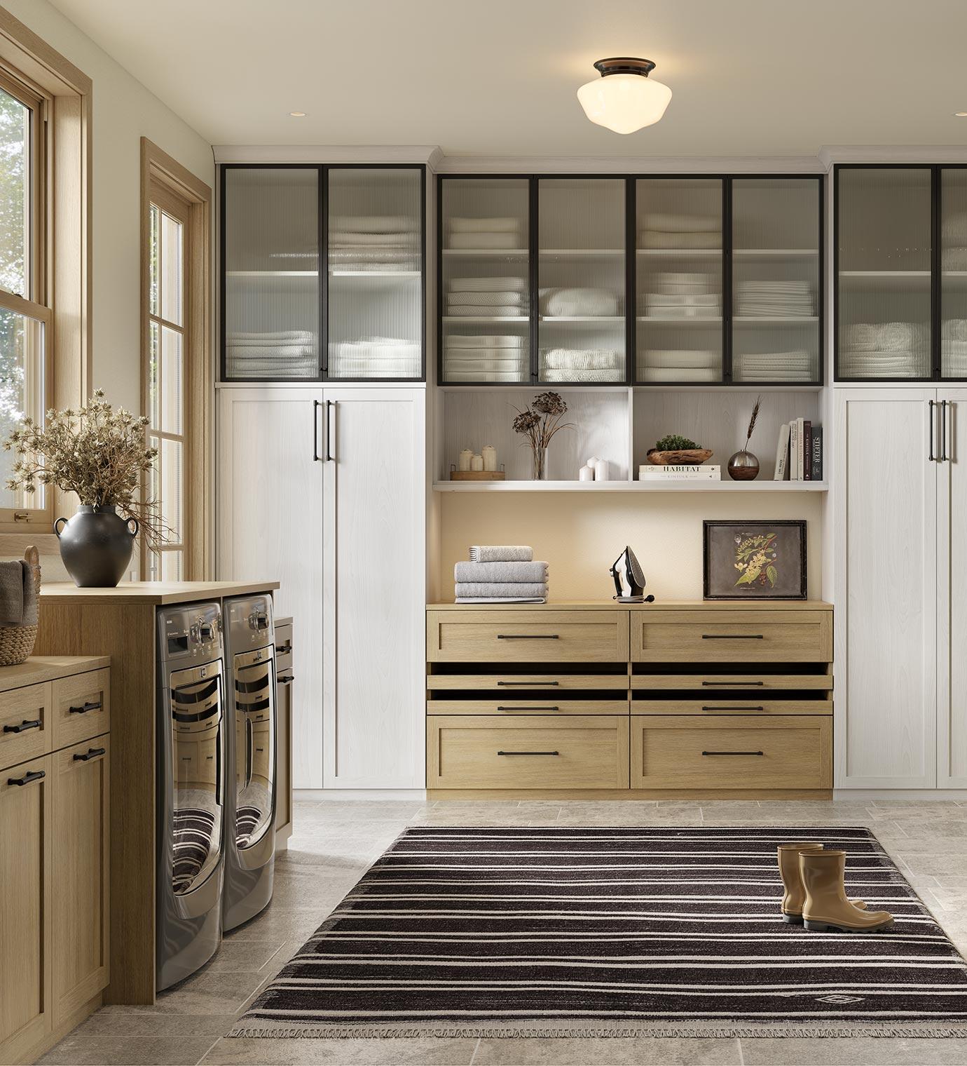 Laundry room storage ideas, custom shelves, cabinets, and iron board in a white gloss finish by California Closets
