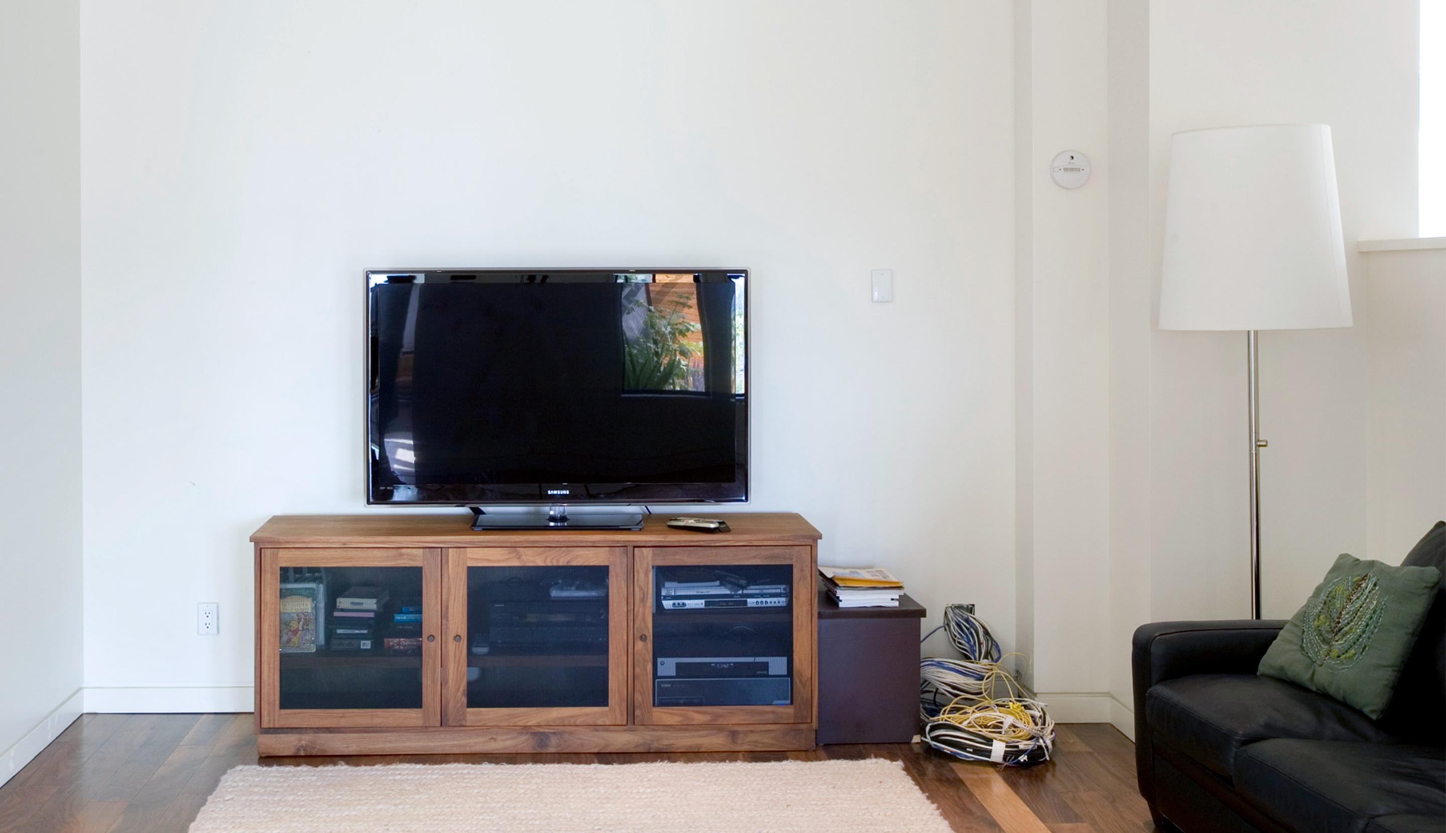 Living room storage solutions and organization to be created and installed by California Closets