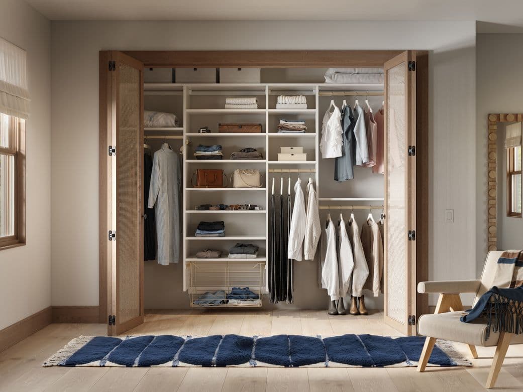Closet with open cubbies and organization baskets designed for teens by California Closets