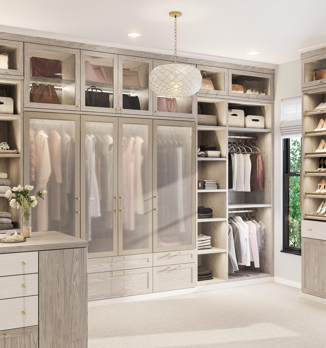 Walk in closet organization with built in pull-out shelving containing closet accessories by California Closets