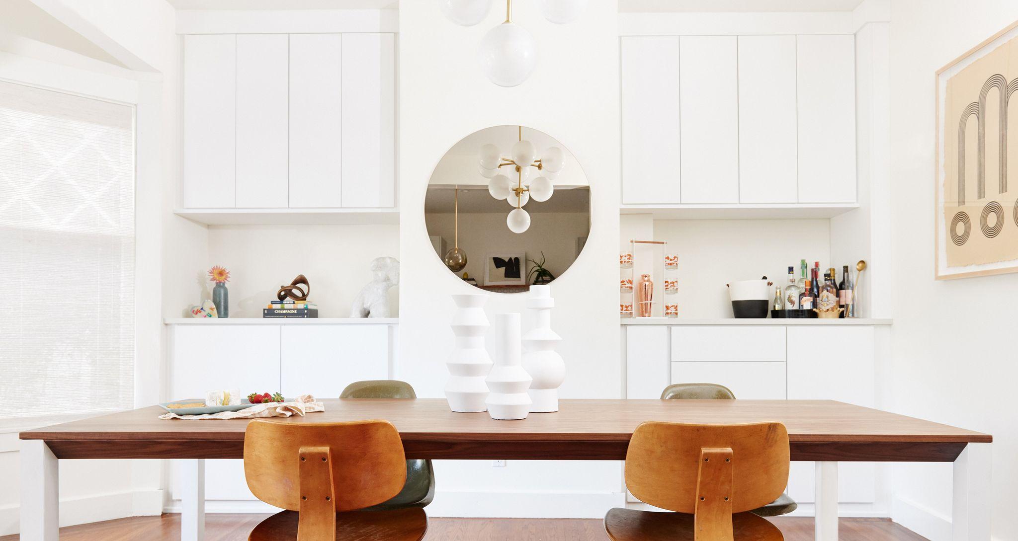Client story for Angela Tafoya dining room table with white cabinets custom made by California Closets