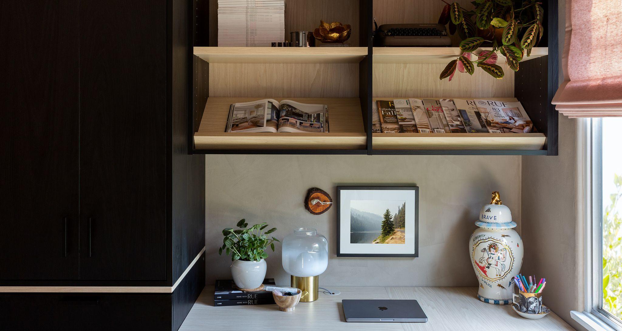 Kelli Lamb's custom cloffice design with vertical storage shelves by California Closets