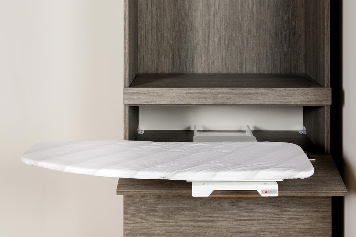 Laundry room custom accessories pull-out swiveling iron board by California Closets