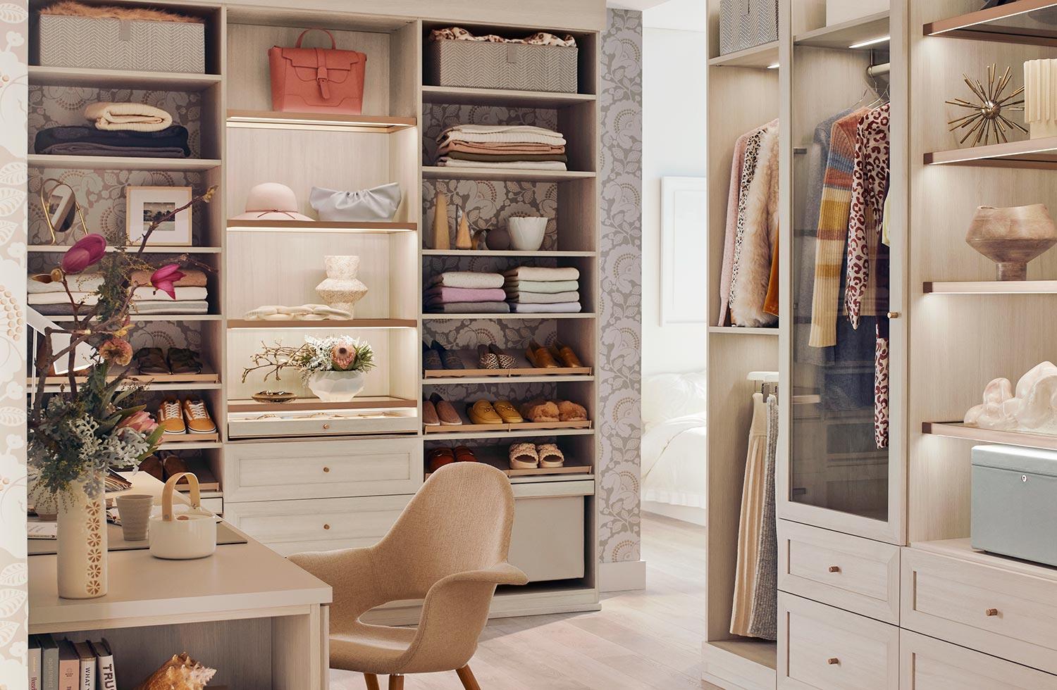 Custom shoe storage for walk in closet dressing room in a light finish by California Closets