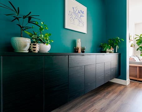 Custom-built in credenza cabinets for dining room by California Closets
